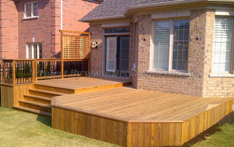 Custom deck and pergola design by M.E. Contracting